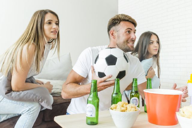 images/people-watching-football-home-with-beers.jpg
